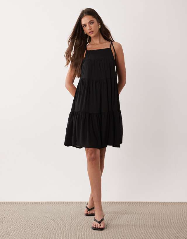 Gina Tricot flowy strap detail mini dress in Black
