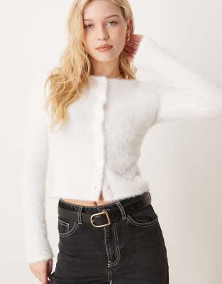 fluffy knit fitted cardigan with crew neck and button front in off white