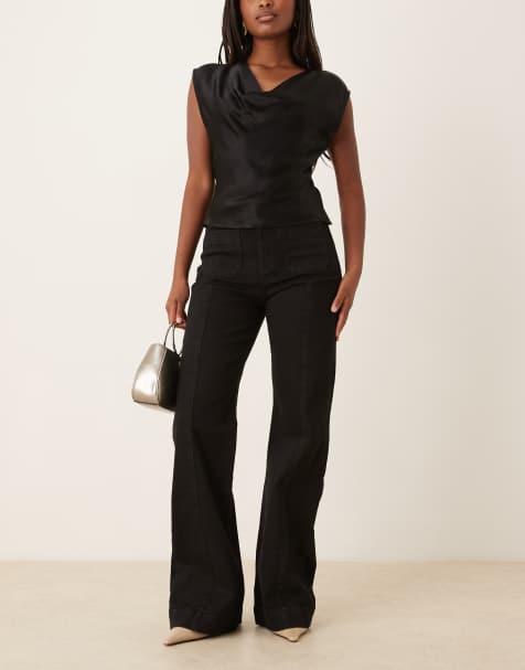 Gina Tricot front pocket wide leg flare jeans in black - view 1