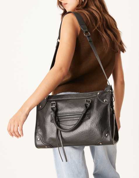 Gina Tricot - Grote tote tas met crossbody band en studs in zwart - view 1