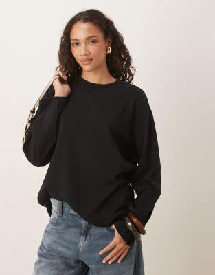 Gina Tricot - Langärmliges Relaxed-Fit-T-Shirt in Schwarz