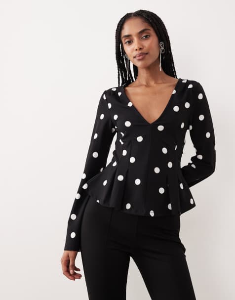 Gina Tricot – Langärmliges Schößchenoberteil in Schwarz mit Polka Dots - view 1