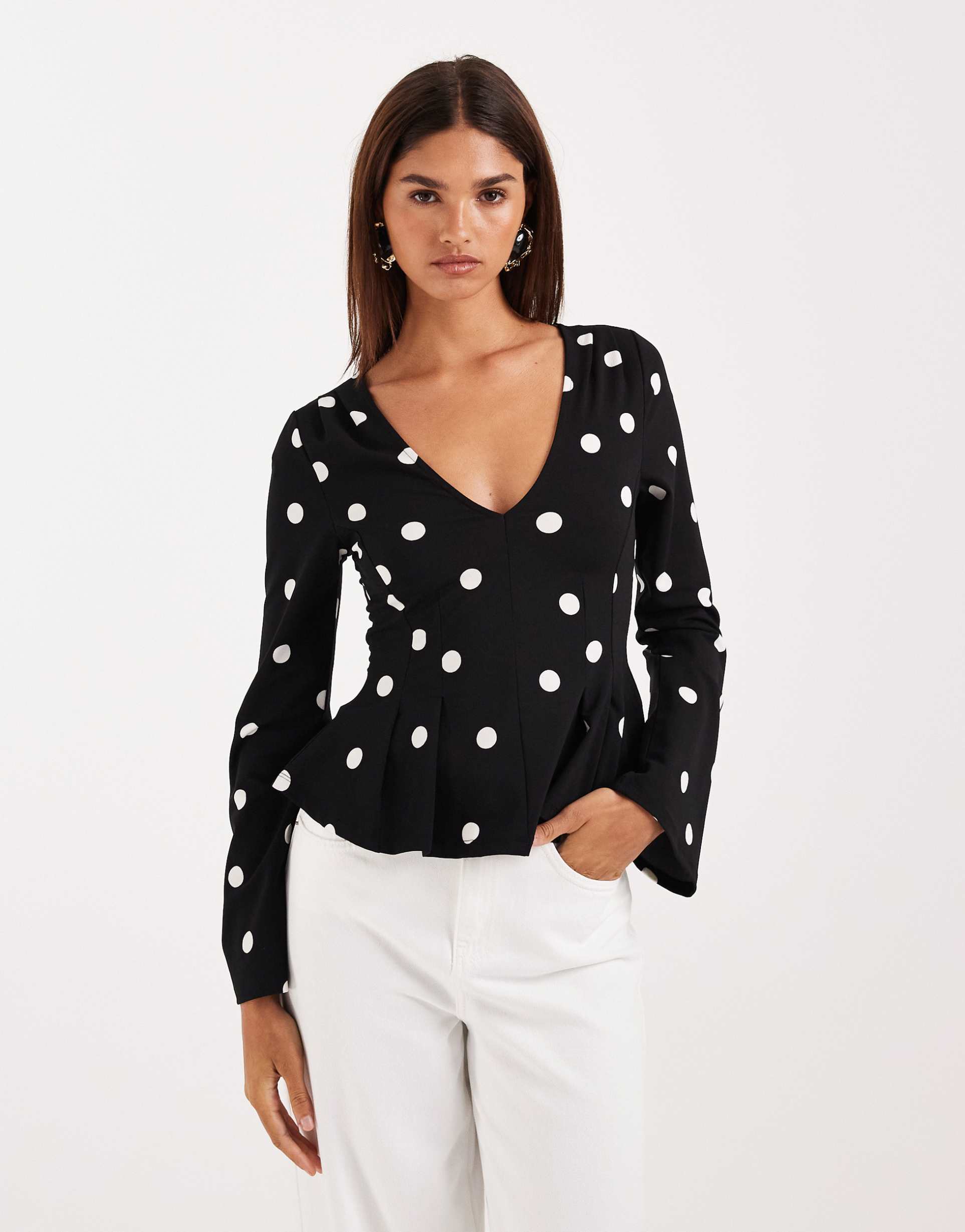 gina tricot long sleeve peplum top in black polka dot