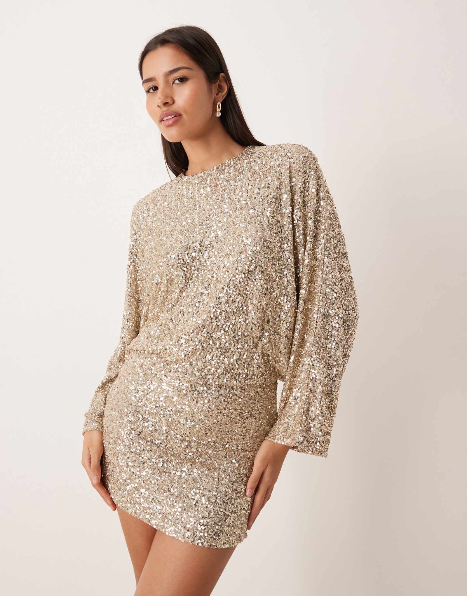 Мини-платье из трикотажа Gina с длинным рукавом и блестками на низкой спине золотого цвета