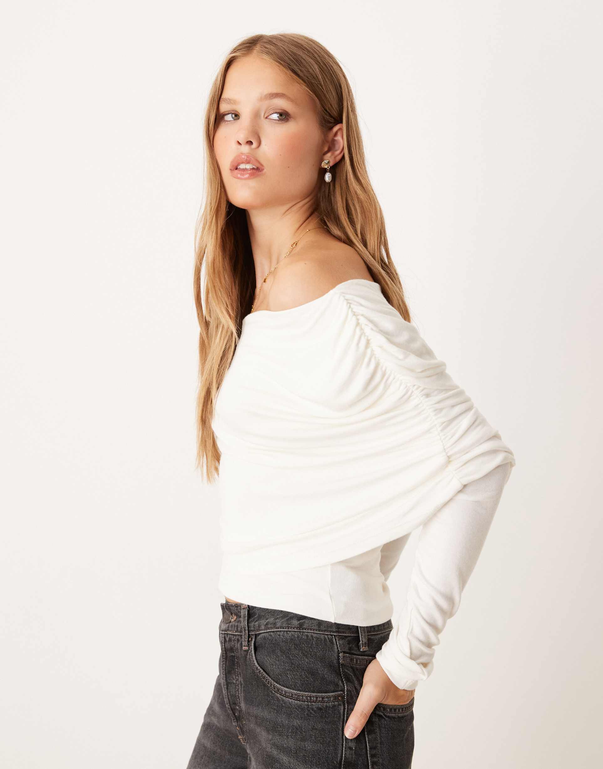 gina tricot long sleeve sloped drapey shoulders cape top in cream