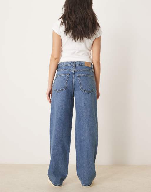 Gina Tricot low waist baggy jeans in midwash blue ASOS