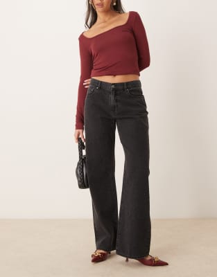 low waist wide leg jeans in washed black with crystal embellishment