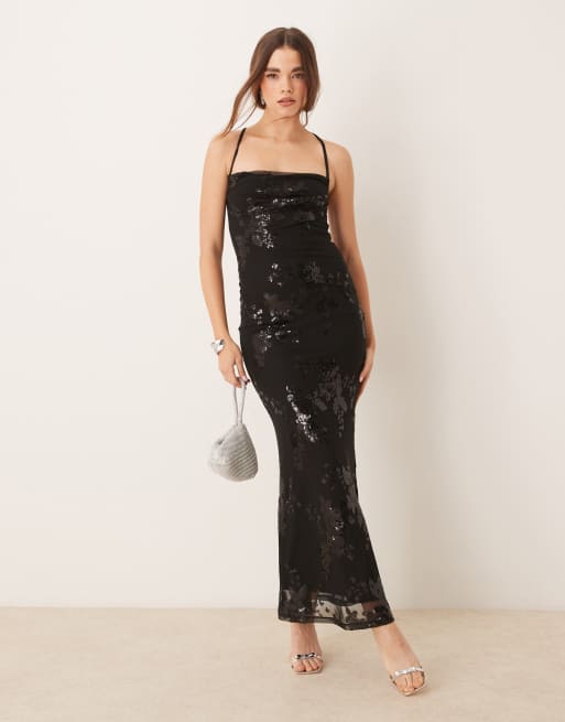 Gina Tricot - Maxi jurk van getextureerd jacquard met stretch, lage achterkant en metallic bloemenpatroon in zwart