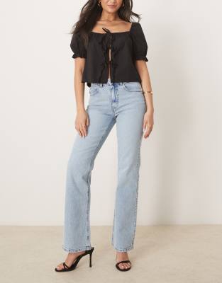 mid rise bootcut flare stretch jeans in light wash blue