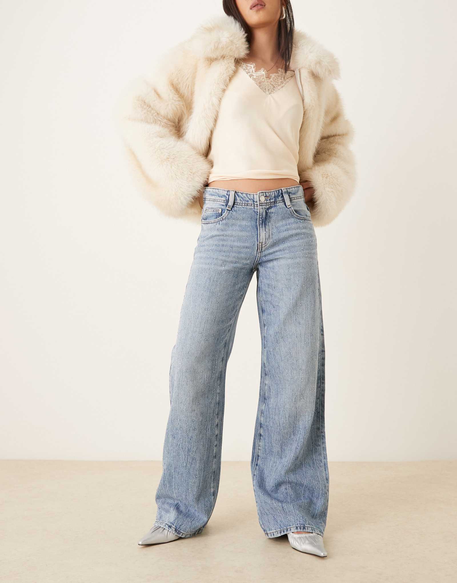 Джинсы из трикотажа Gina с украшением на талии темно-синего цвета