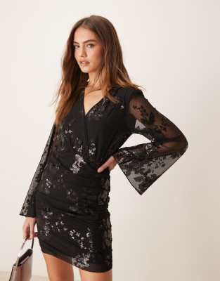 mini dress with wrap front in black with textured shimmer jacquard floral pattern