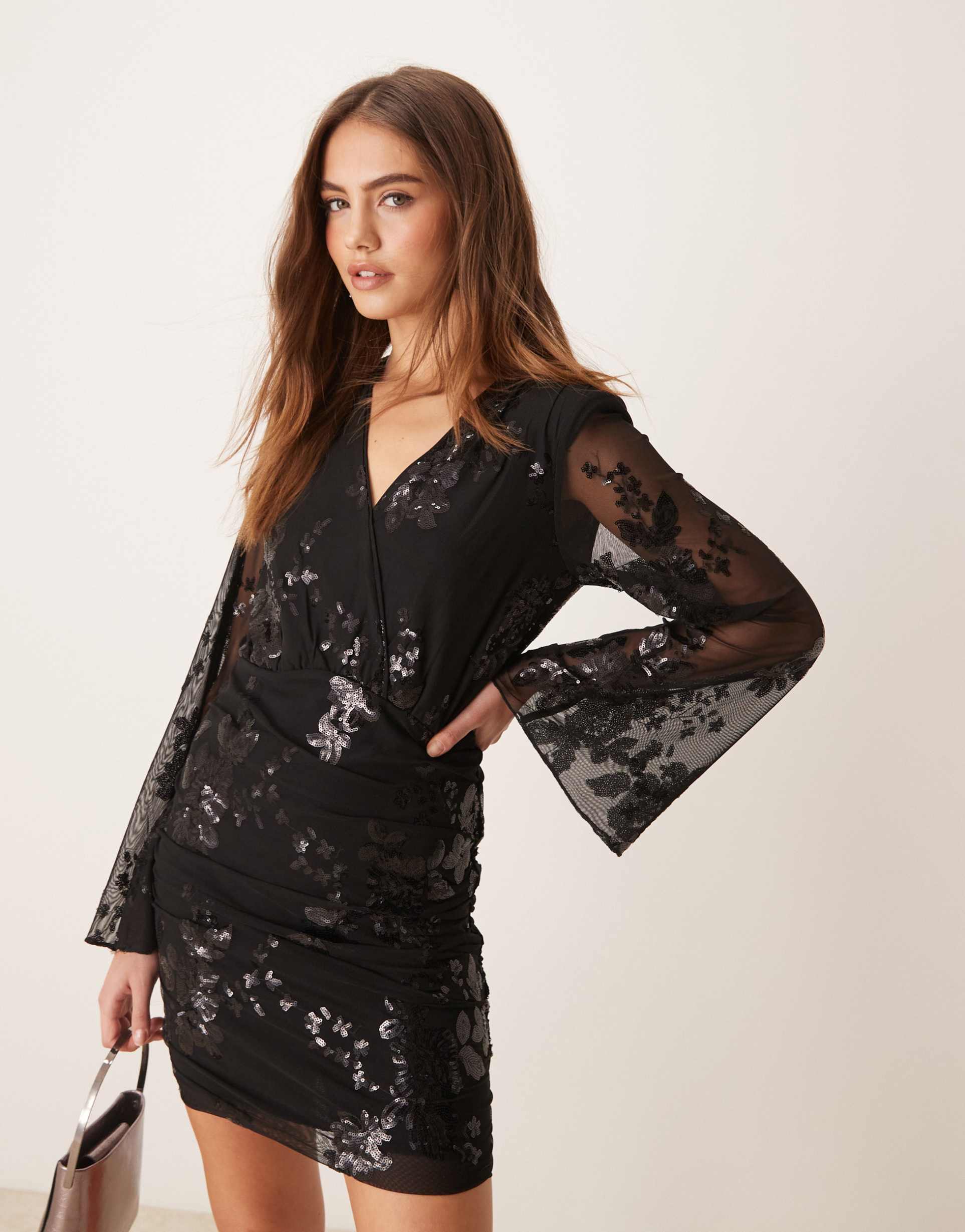 gina tricot mini dress with wrap front in black with textured shimmer jacquard floral pattern