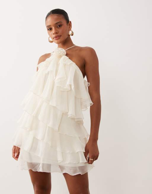 Gina Tricot mini ruffle halterneck mini dress with rose corsage in white |  ASOS