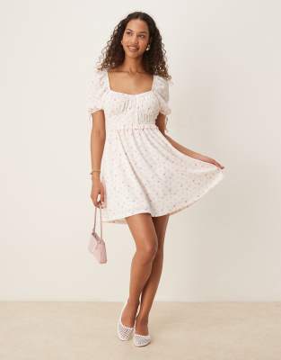 Gina Tricot - Minikleid in Rosa mit kurzen Puffärmeln und Blümchenmuster