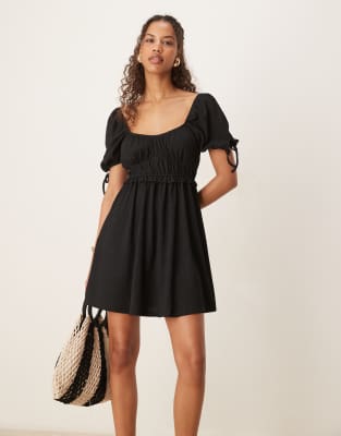 Gina Tricot - Minikleid in Schwarz mit kurzen Puffärmeln