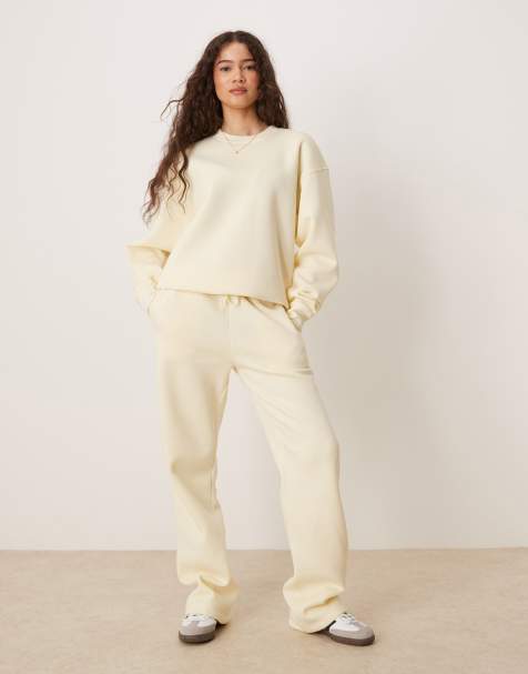 Gina Tricot - Mix en match - Joggingbroek met losse pasvorm en rechte pijpen en trui in sorbet geel - view 1