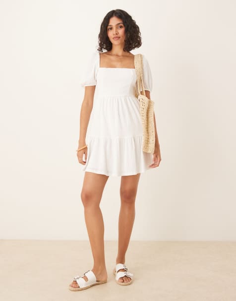 Gina Tricot – Naturvit, kort sommarklänning med korta ärmar och knytband baktill - view 1