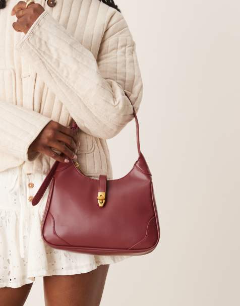 Gina Tricot one handle shoulder bag with gold buckle in red burgundy - view 1