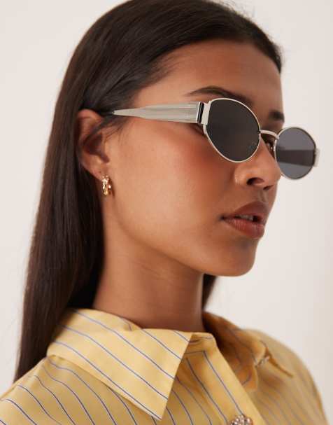 Gina Tricot oval metal frame sunglasses in silver with black lens - view 1