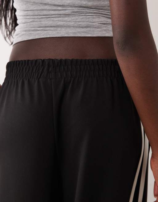 Gina Tricot - Pantalon large style sport à rayures - Noir et blanc, 4 de 5