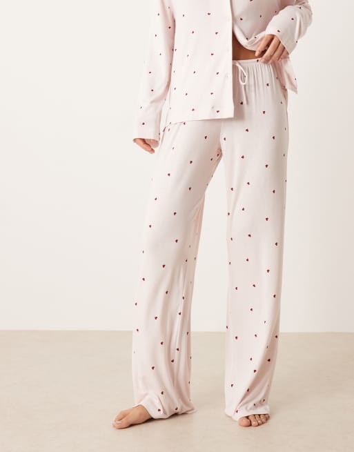 Gina Tricot - Pantaloni del pigiama morbidi mix and match rosa con stampa a cuori rossi 