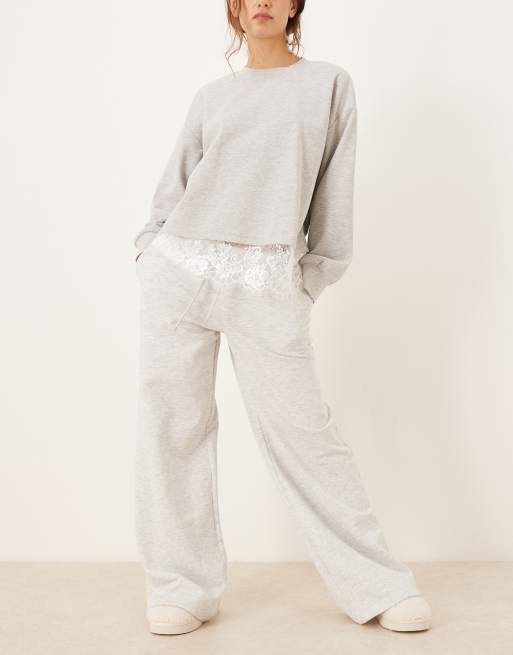 Gina Tricot - Pantaloni della tuta a vita bassa grigio chiaro mélange con coulisse