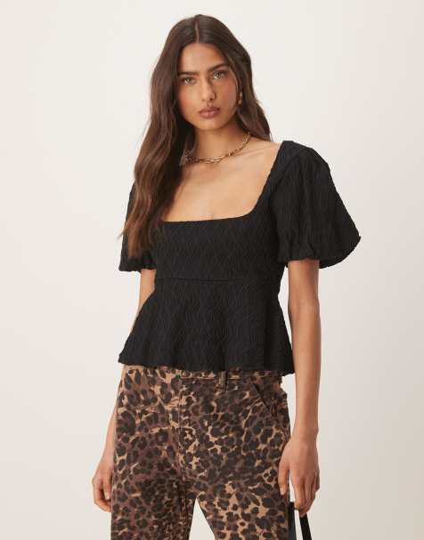 Gina Tricot - Peplum top met pofmouwen en textuur in zwart - view 1