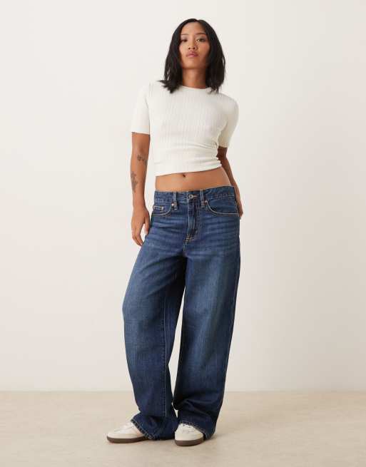 Gina Tricot Petite – Ciemnoniebieskie jeansy baggy z baryłkowymi nogawkami i niskim stanem