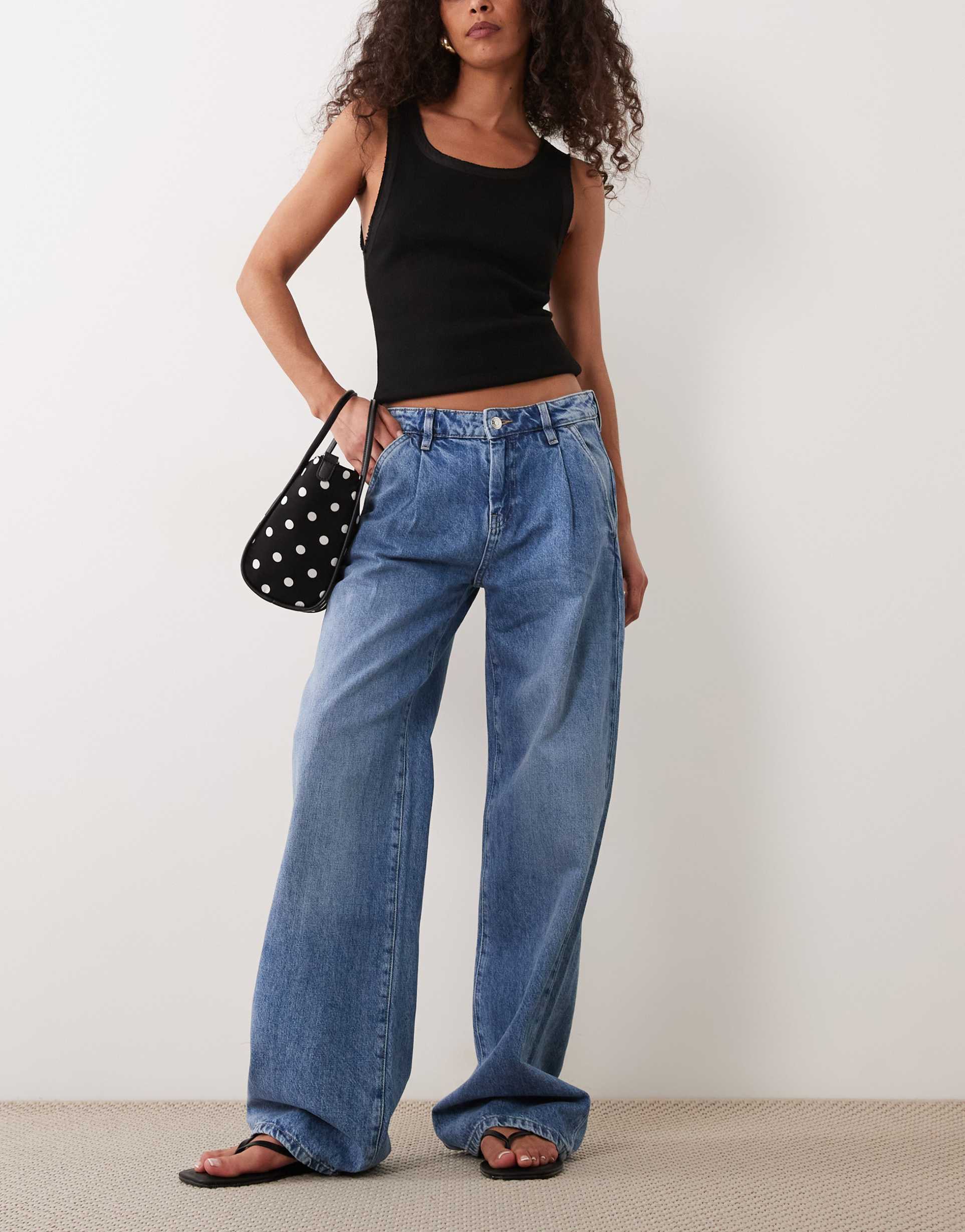 gina tricot pleated slouchy jeans in midwash blue