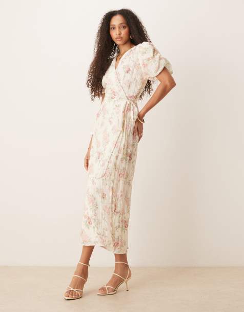 Gina - Tricot pofjurk met korte mouw en overslagsluiting aan de voorkant in gele bloemenprint - view 1