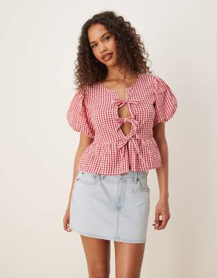 GINA TRICOT Gina Tricot puff short sleeve bow blouse in red check