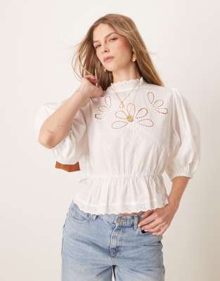 puff sleeve blouse top with embroidered cutwork front bodice detail in white