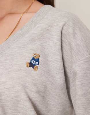 GINA TRICOT RELAXED FIT V NECK SWEATER WITH TEDDY BEAR GRAPHIC 