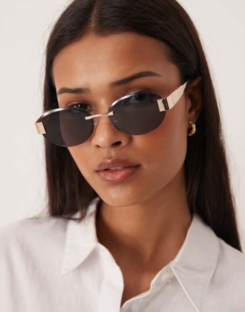 Gina Tricot rimless sunglasses in black and gold tone - view 1