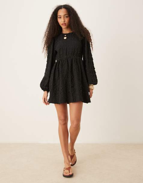 Gina Tricot - Robe courte texturée avec dos nu noué et manches volumineuses - Noir - view 1
