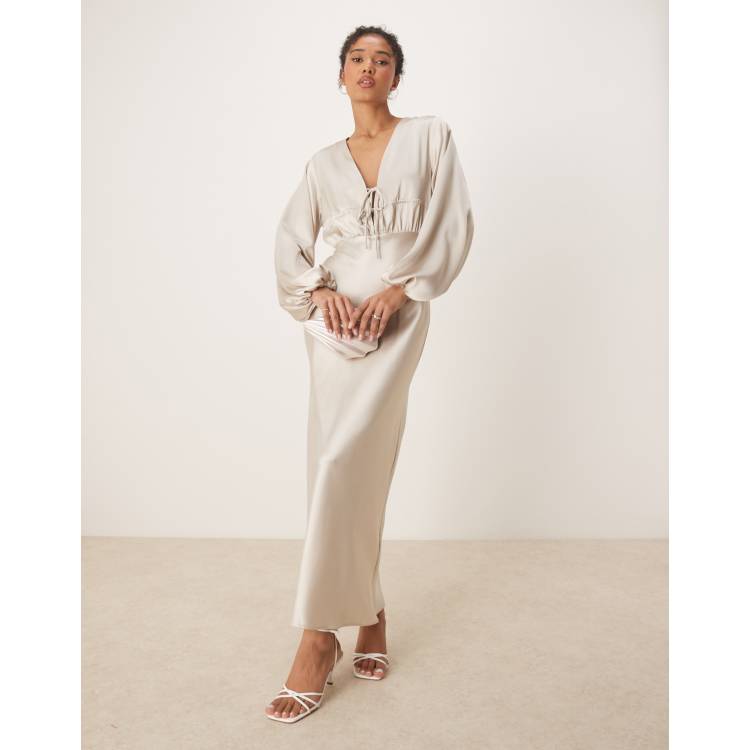Gina Tricot satin long sleeve v neck tie front dress with ruched details in  light beige | ASOS