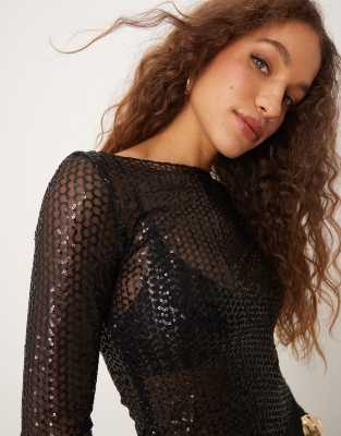 sequin sheer long sleeve top with boat neck in black