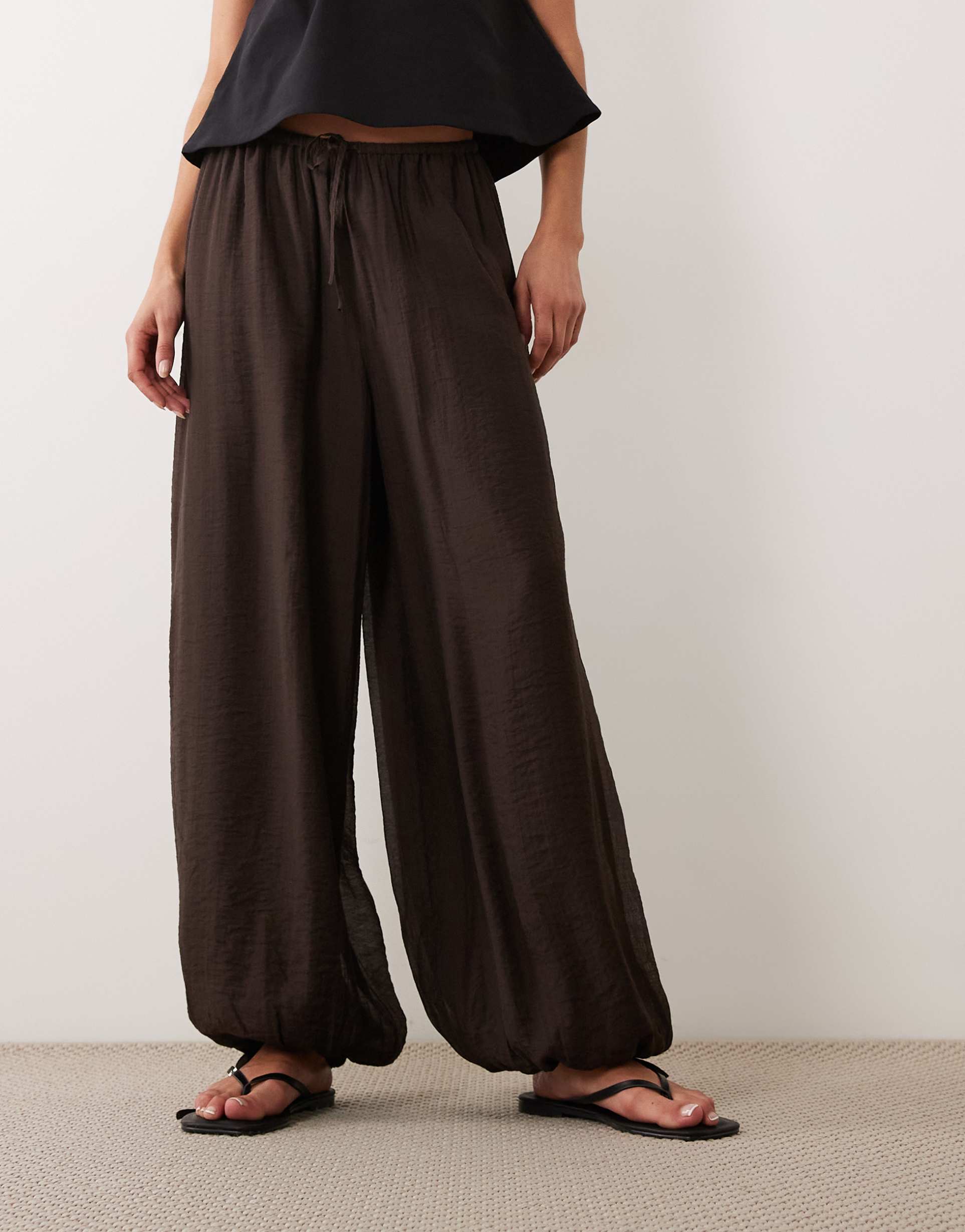 gina tricot sheer balloon pants in dark brown