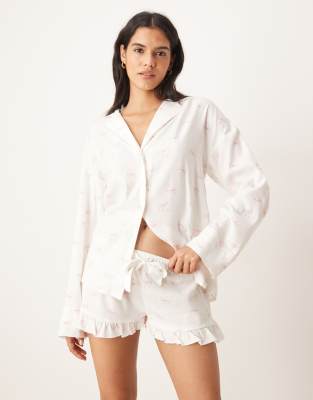 Gina Tricot - Short de pyjama à assortir en flanelle à volants et imprimé nauds - Blanc et rose