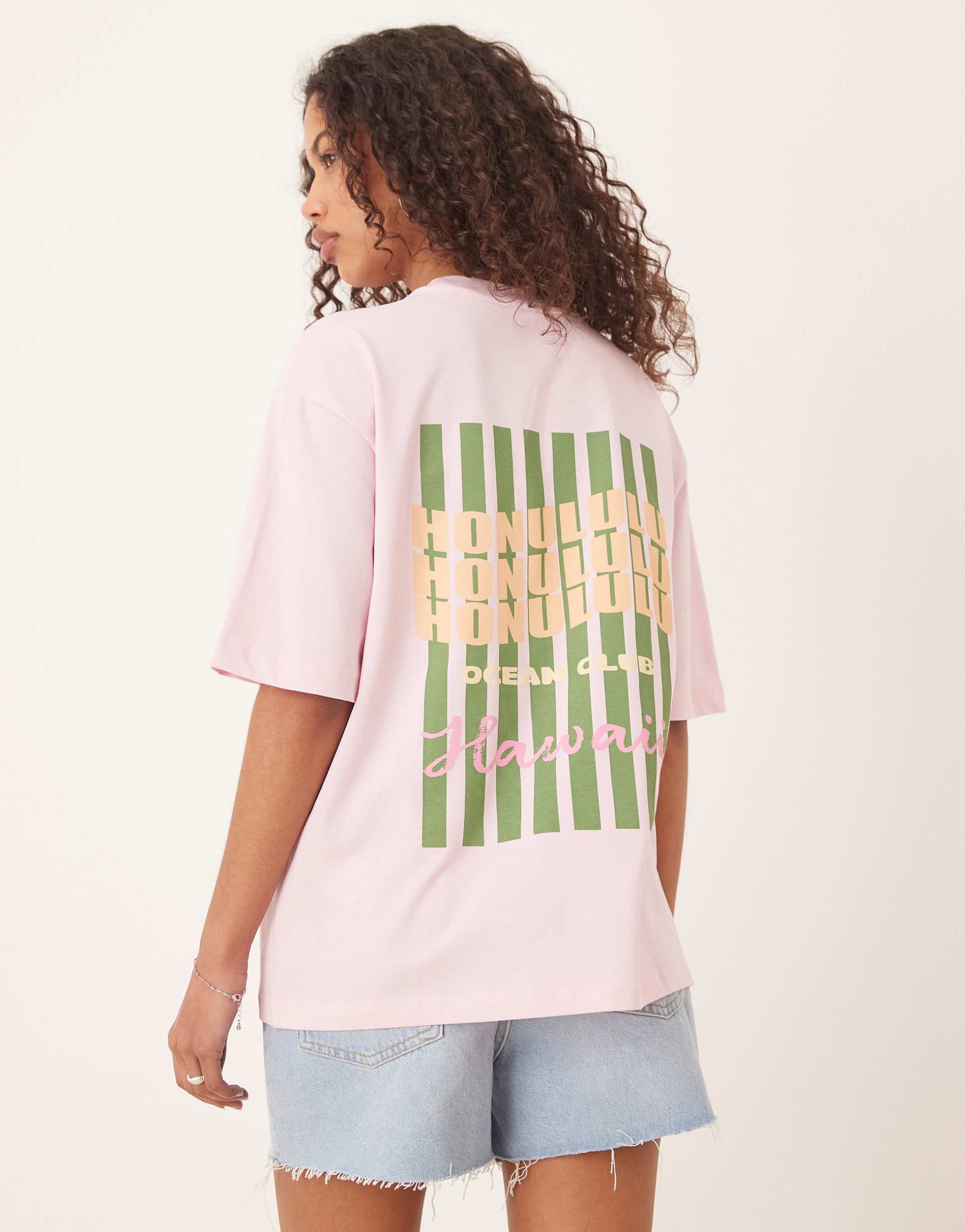 gina tricot short sleeve beach club graphic oversized t-shirt in light pink