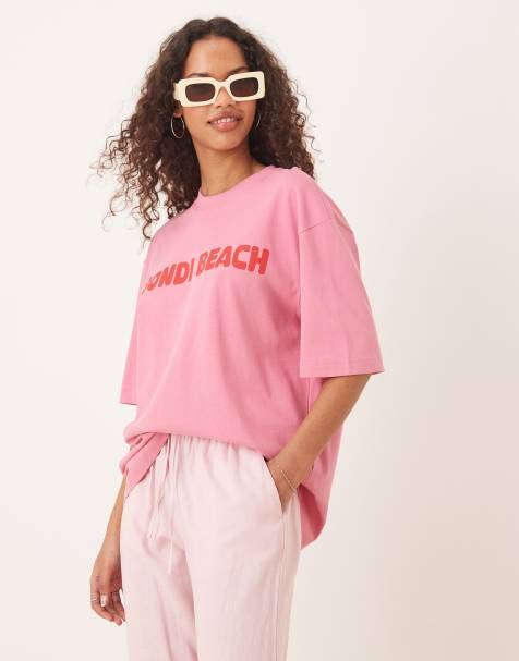 Gina Tricot short sleeve bondi beach graphic oversized t-shirt in pink - view 1
