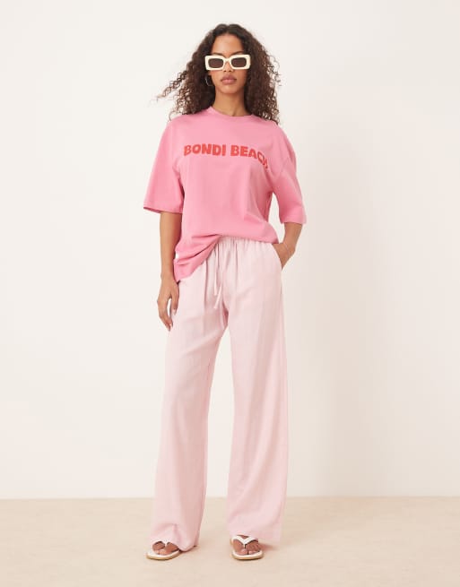 Gina Tricot short sleeve bondi beach graphic oversized T-shirt in pink