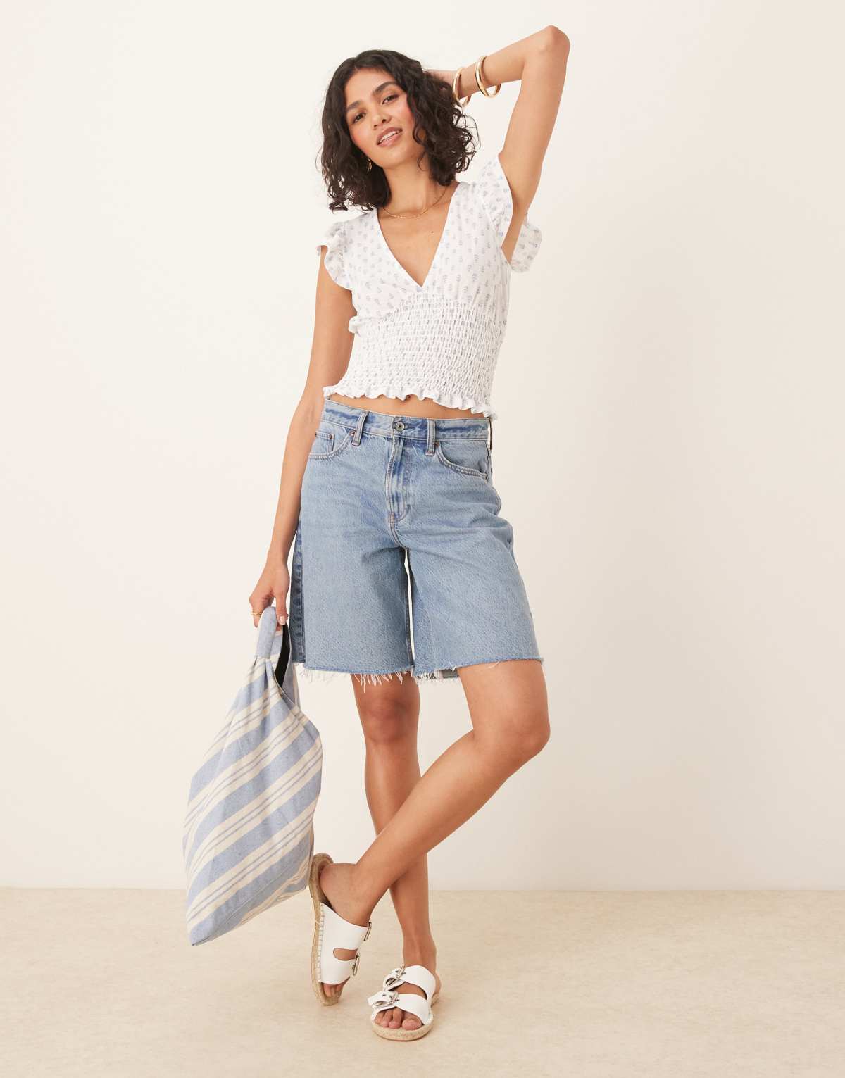 Gina Tricot short sleeve frill v neck top in white and blue print