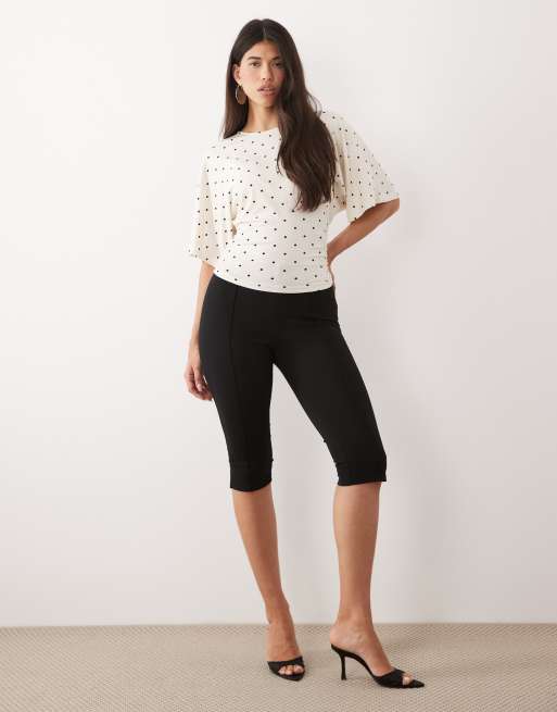 Gina Tricot short sleeve tie back top in white polka dots, 2 of 4