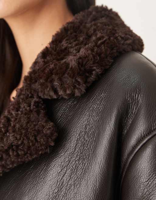 Gina Tricot short teddy PU belted jacket in black with brown collar trims, 2 of 4