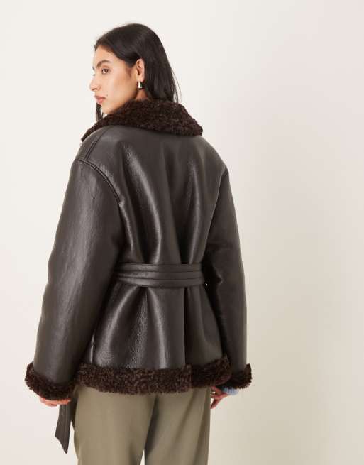 Gina Tricot short teddy PU belted jacket in black with brown collar trims, 3 of 4