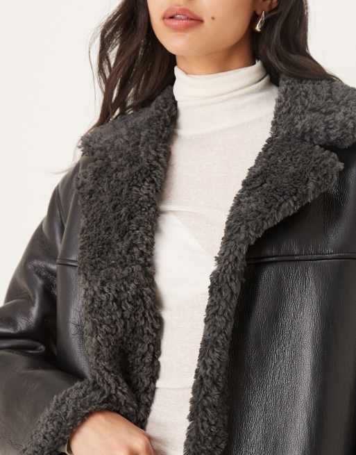 Gina Tricot short teddy PU belted jacket in black with dark grey collar trims, 2 of 4