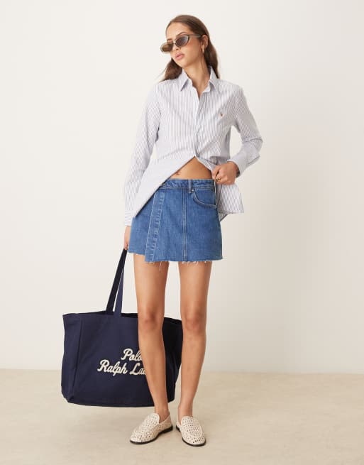 Gina Tricot – Skort aus Denim in mittelblauer Waschung mit Wickeldetail vorne