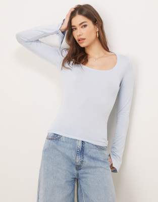 soft touch long sleeve top with scoop neck and split cuffs in blue