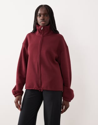 Sport-Oberteil aus weichem Teddyfleece in Burgunderrot mit Reißverschluss Rot L